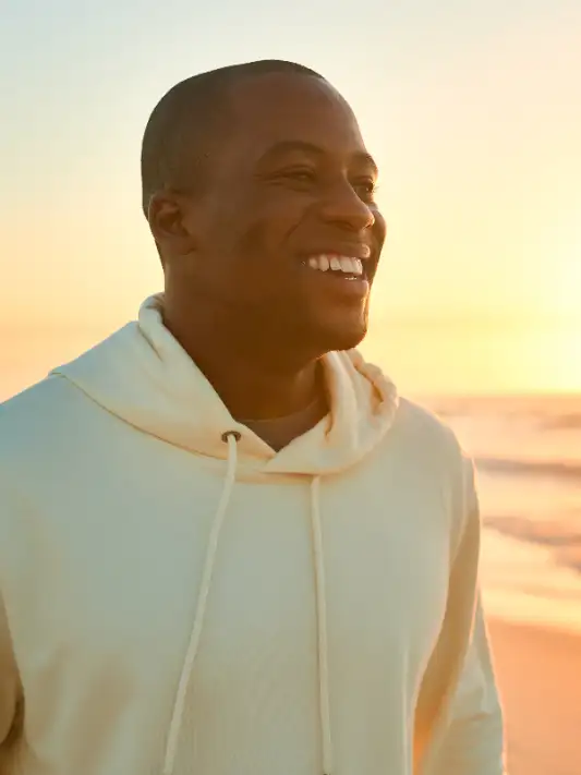 A man smiles after receiving medical weight loss services at Salveo Medicine in Ponte Vedra, FL.